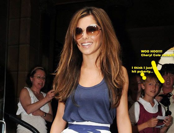 Reports say that Cheryl Cole is not happy with her regrettable tattoo on her Reports say that Cheryl Cole is not happy with her regrettable tattoo on her