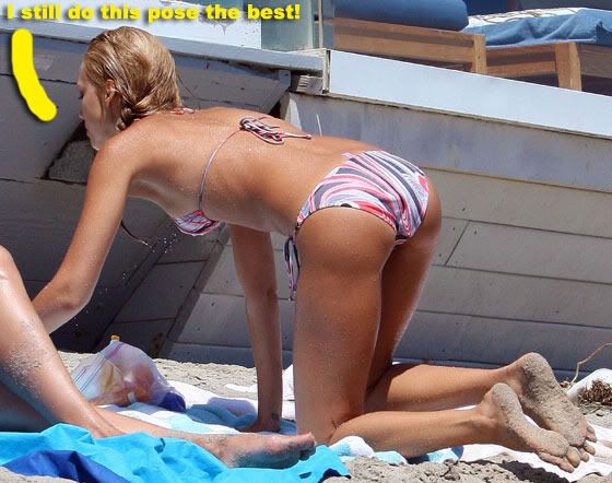 Jessica Alba is back at it again showing off her sexy super MILF bikini bod