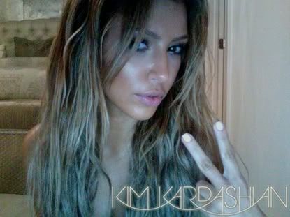 kim kardashian blonde hair 2009. Kim Kardashian#39;s latest fake