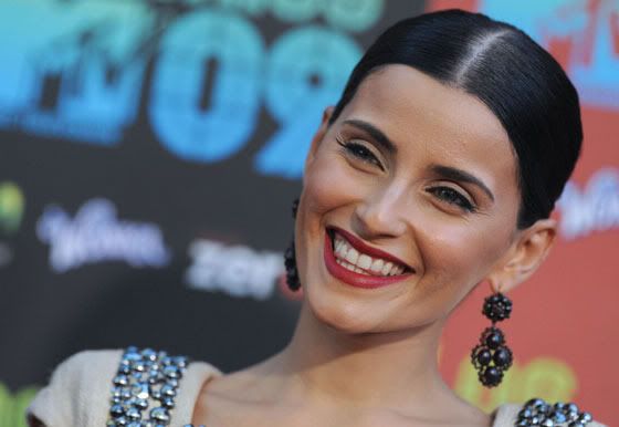 Nelly Furtado is 30 years old and is already making plans to strip for 