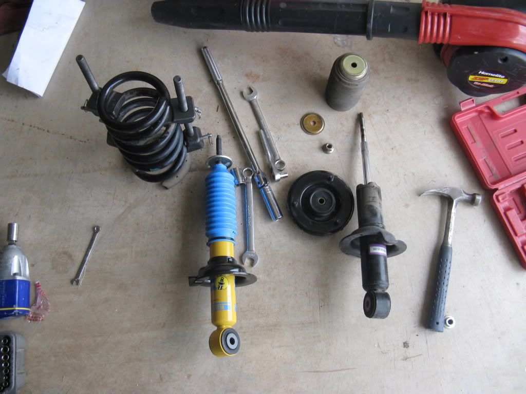 How To change out front struts and front rotors Nissan Armada